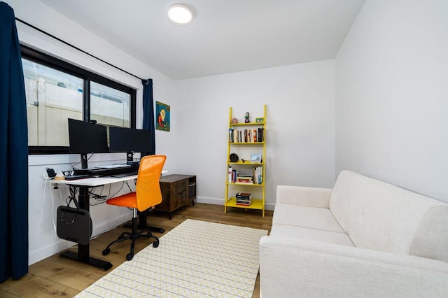 office space with dark hardwood / wood-style flooring