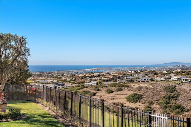 view of yard with fence and a residential view