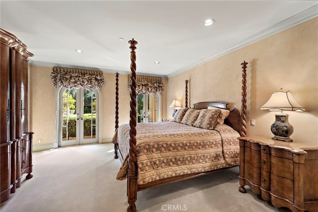 carpeted bedroom with crown molding, access to outside, and french doors