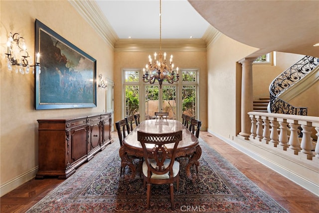 dining room featuring ornamental molding, baseboards, a notable chandelier, and stairs