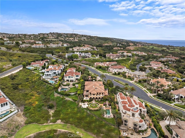 aerial view with a residential view and a water view