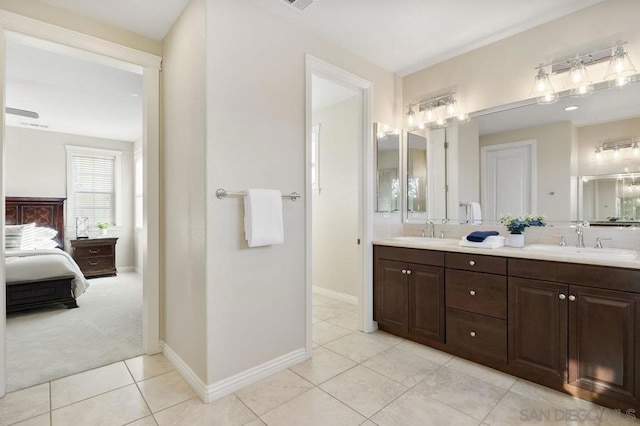 bathroom featuring tile patterned floors and vanity