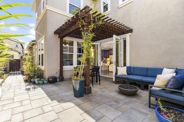 view of patio / terrace with an outdoor hangout area and a pergola