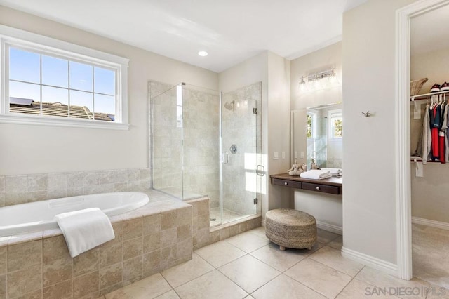 bathroom with plus walk in shower and tile patterned floors