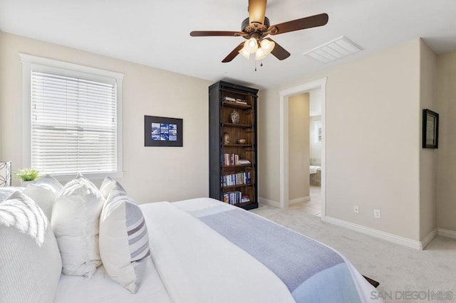 carpeted bedroom featuring ceiling fan