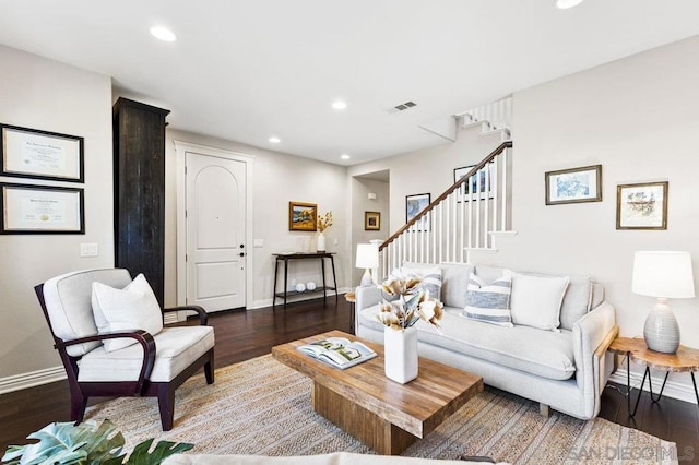 living room featuring dark hardwood / wood-style flooring