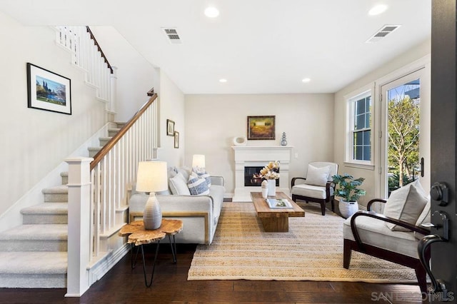 living room featuring dark hardwood / wood-style floors