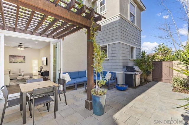 view of patio with grilling area, an outdoor hangout area, and a pergola