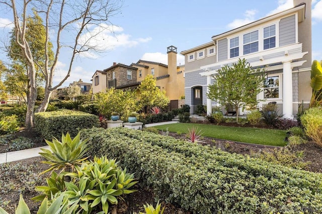 view of front facade with a front lawn