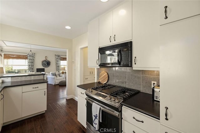 kitchen featuring white cabinetry, gas stove, dark wood-type flooring, and decorative backsplash