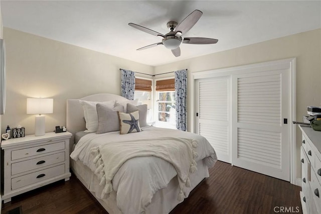 bedroom featuring ceiling fan and dark hardwood / wood-style flooring