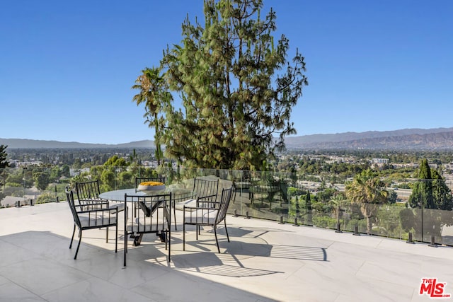 view of patio with a mountain view