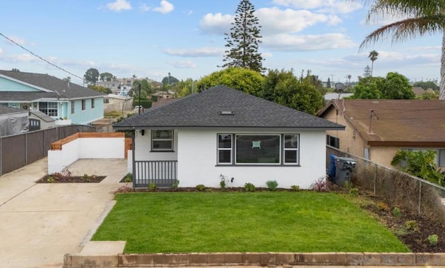 view of front of home with a front yard