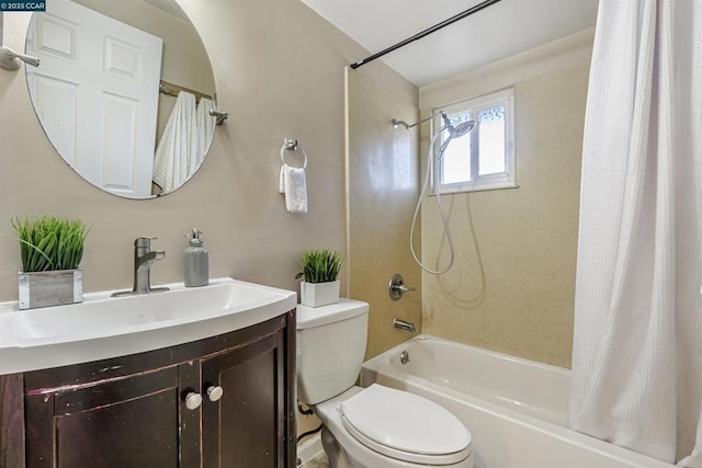 full bathroom with shower / tub combo, vanity, and toilet