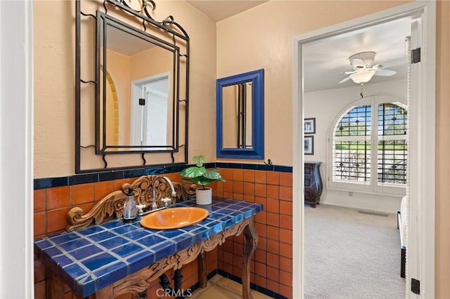 bathroom with sink and ceiling fan