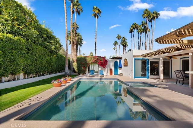 view of swimming pool featuring a pergola and a patio