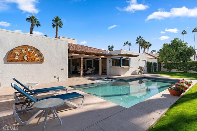 view of swimming pool featuring a patio area