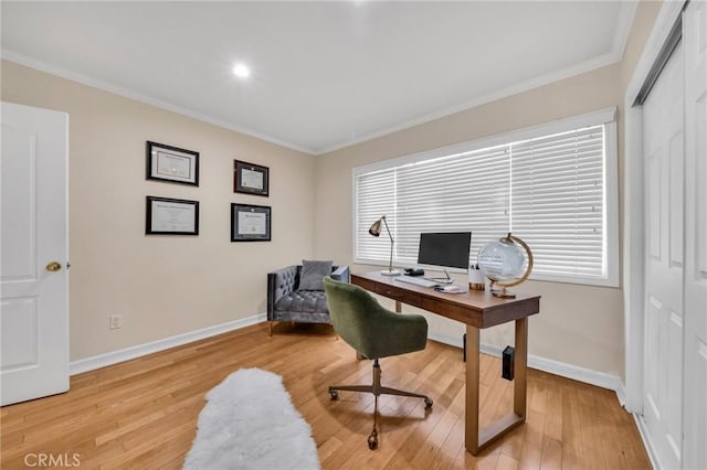 office space with crown molding and hardwood / wood-style flooring