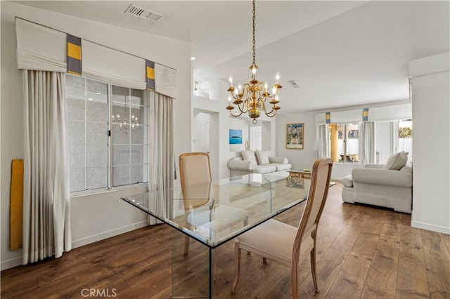 30431 Sunrose Pl, Canyon Country, CA 91387 - dining space with dark wood-style flooring and a chandelier
