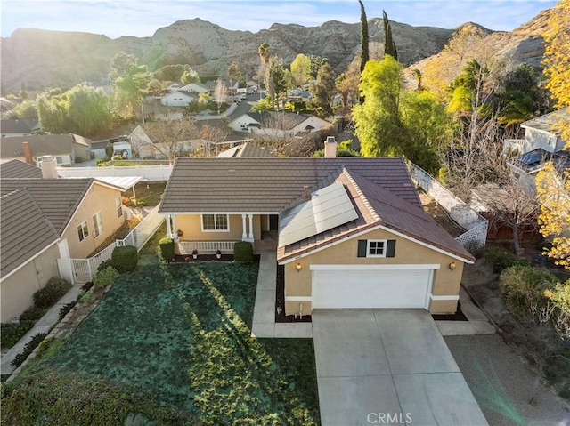 bird's eye view with a residential view and a mountain view