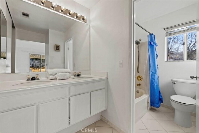 30431 Sunrose Pl, Canyon Country, CA 91387 - bathroom featuring tile patterned floors, double vanity, and shower / bath combo