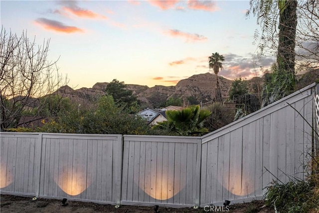 30431 Sunrose Pl, Canyon Country, CA 91387 - yard at dusk featuring a mountain view