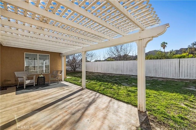 view of patio / terrace featuring a fenced backyard and a pergola