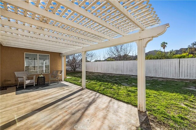 30431 Sunrose Pl, Canyon Country, CA 91387 - fenced backyard with a patio area, a pergola, and a mountain view