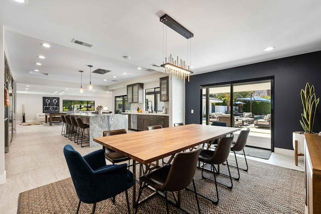 dining room featuring sink