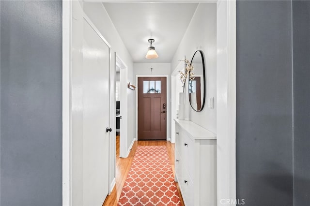 doorway featuring light hardwood / wood-style floors