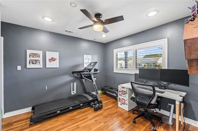 office space with ceiling fan and hardwood / wood-style floors