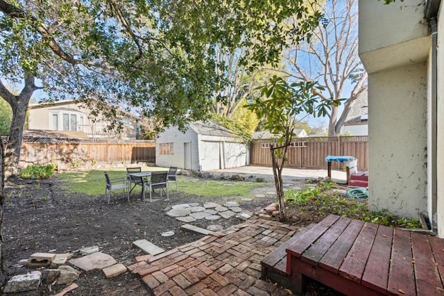 view of patio with a storage unit