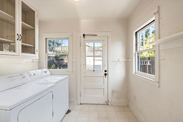 laundry area featuring washing machine and dryer