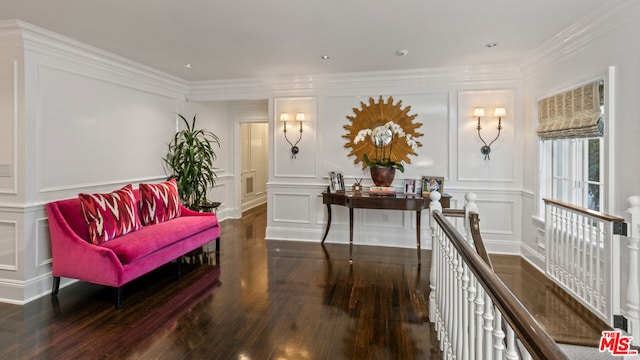 interior space featuring ornamental molding and dark wood-type flooring