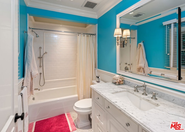 full bathroom featuring ornamental molding, toilet, shower / bath combo with shower curtain, and vanity