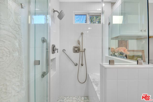 bathroom featuring walk in shower