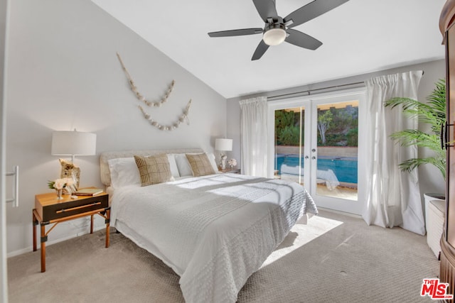 bedroom with lofted ceiling, ceiling fan, access to exterior, light colored carpet, and french doors