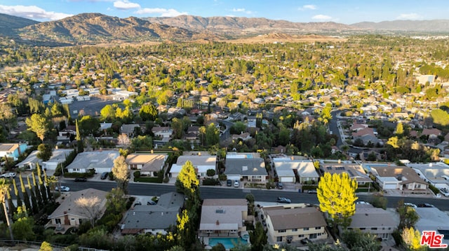 bird's eye view with a mountain view