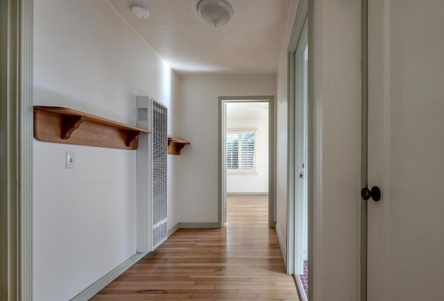 corridor featuring light wood-type flooring