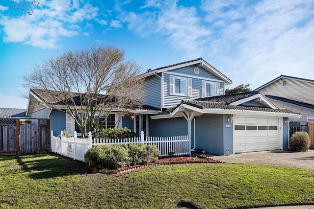 front of property featuring a garage and a front lawn