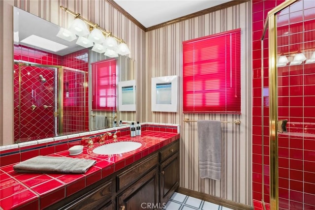 bathroom with vanity, tile patterned flooring, and a shower with door