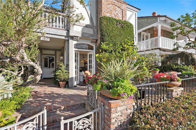 view of front of home with a balcony