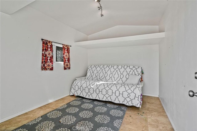 966 W 23rd St, San Pedro, CA 90731 - tiled bedroom with lofted ceiling, track lighting, and baseboards