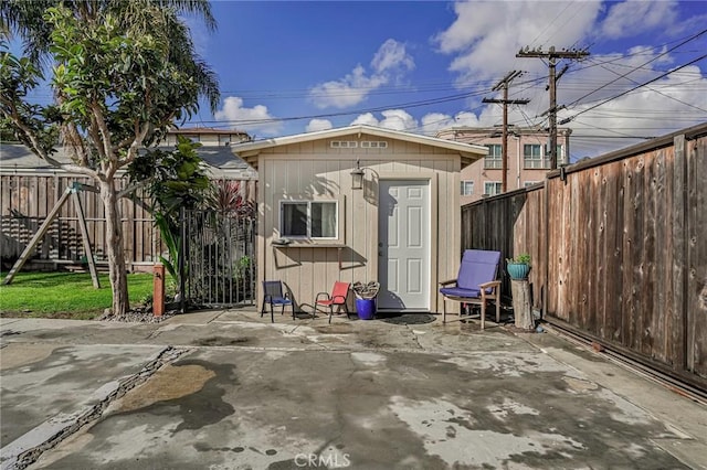 view of shed featuring a fenced backyard