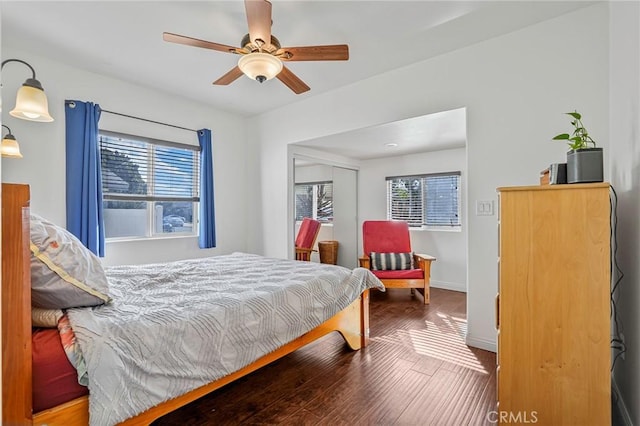 966 W 23rd St, San Pedro, CA 90731 - bedroom with multiple windows, baseboards, wood finished floors, and a ceiling fan