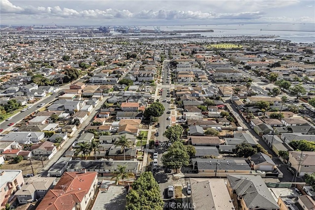 aerial view featuring a water view and a residential view