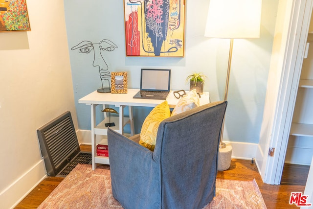 sitting room featuring hardwood / wood-style flooring