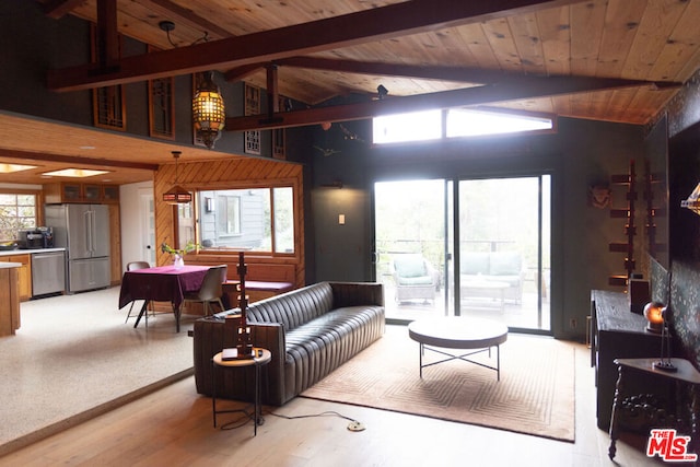 living room with beamed ceiling, light wood-type flooring, wood ceiling, and high vaulted ceiling