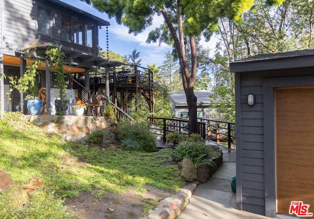 view of yard with a deck