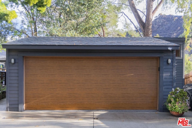 garage featuring a mountain view